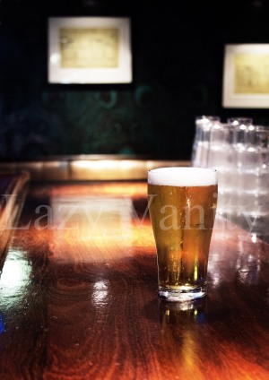 Edited Image of Beer Glass on Bar's Counter