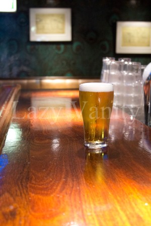 Beer Glass on a Bar Counter